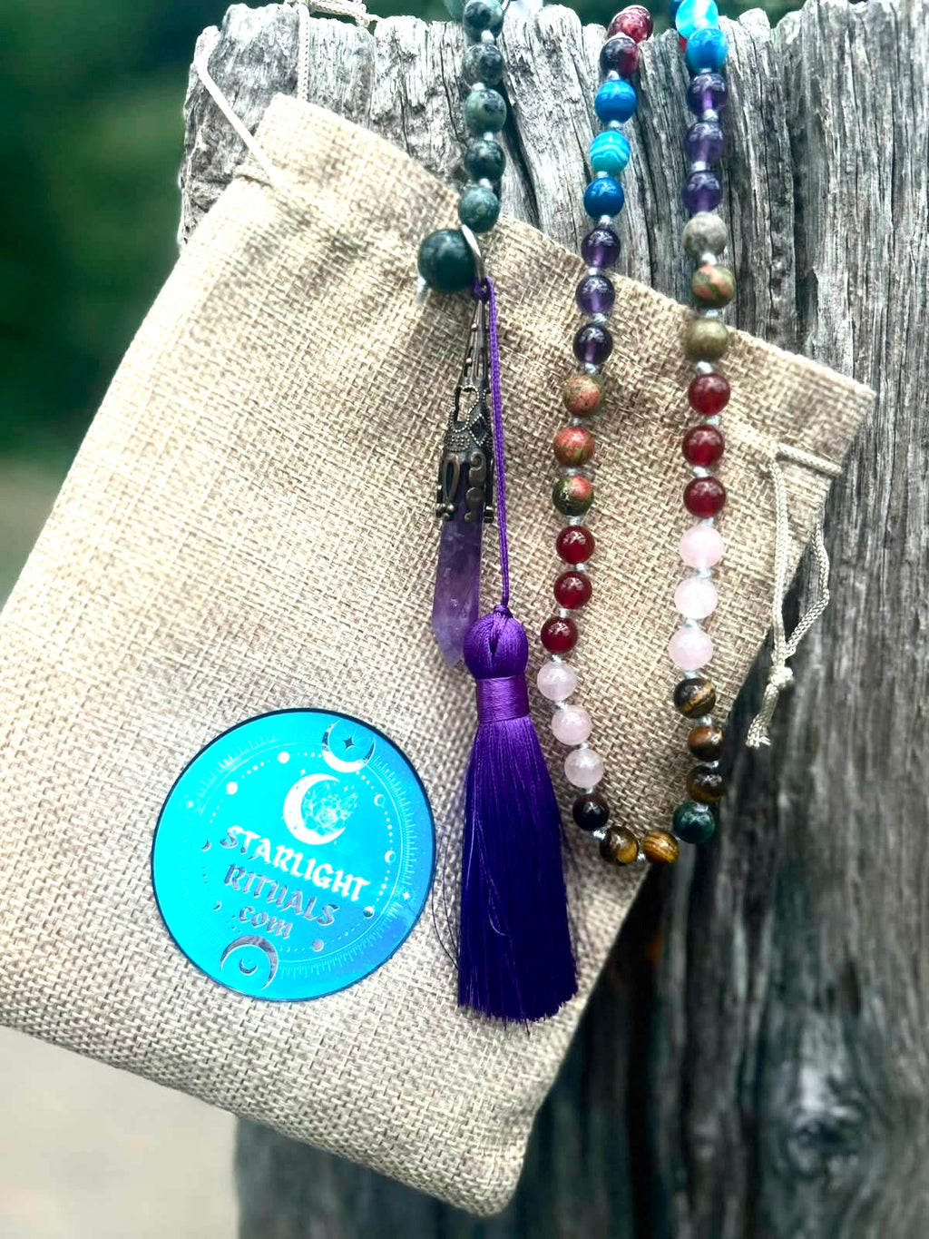 Handcrafted bespoke crystal mala by Starlight Rituals presented with a natural hessian storage pouch, premium rayon tassel and branded keepsake tag.